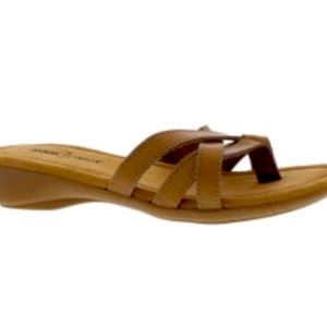 Brand new still in box Minnetonka sandals! Tan and brown Size 8
